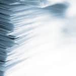 Pile of papers with high key effect